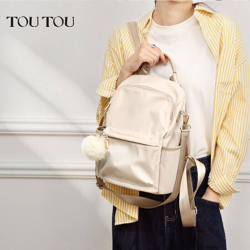 toutou女包大容量书包学院风旅行时尚背包双肩包4544杏仁白属于什么档次？