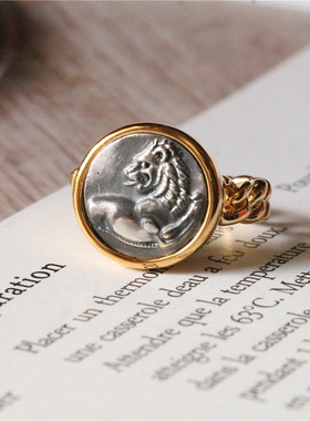 陶然物语925银镀金狮开口古币