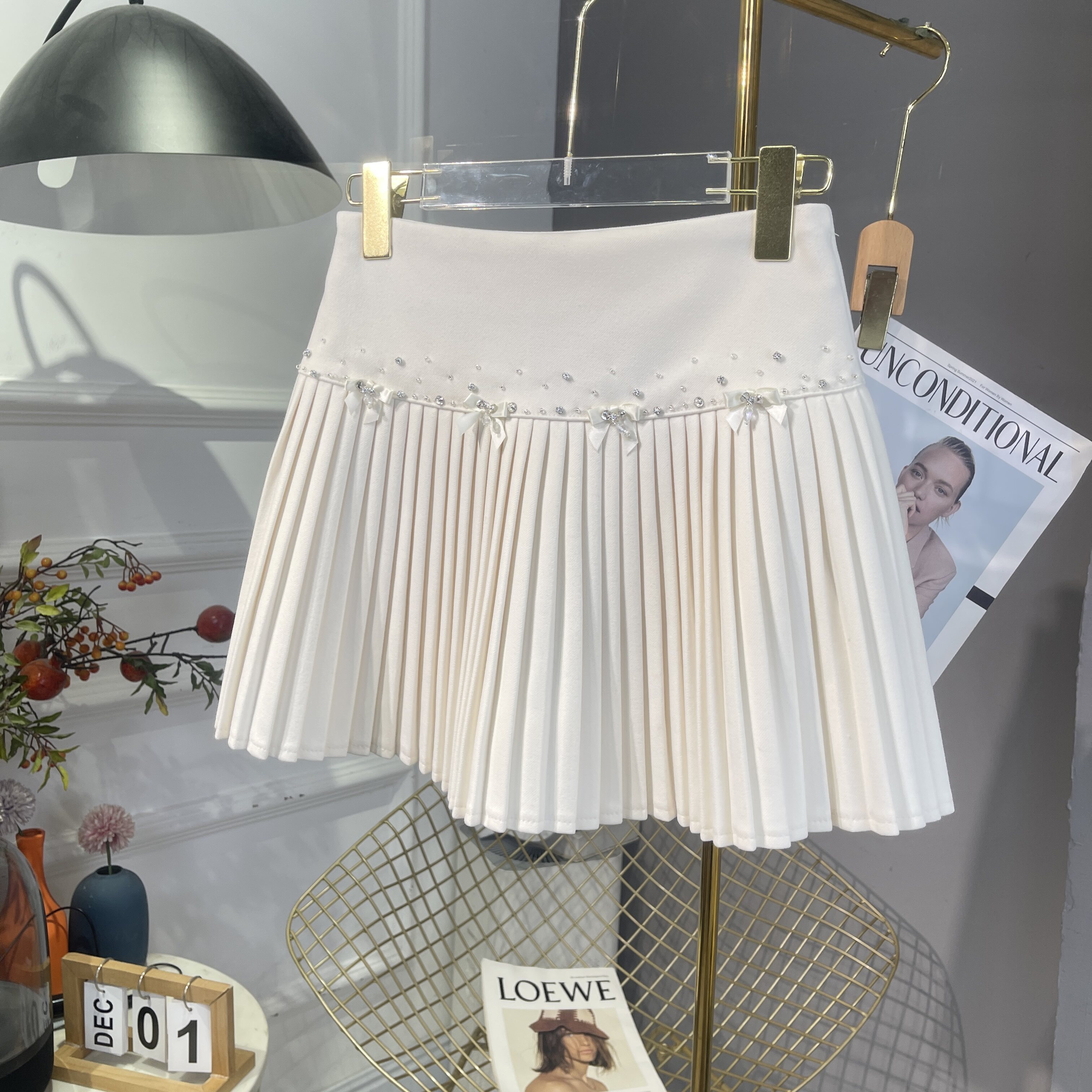 2025年秋冬新款女装蝴蝶结毛呢防走光短裙百搭高腰A字百褶半身裙