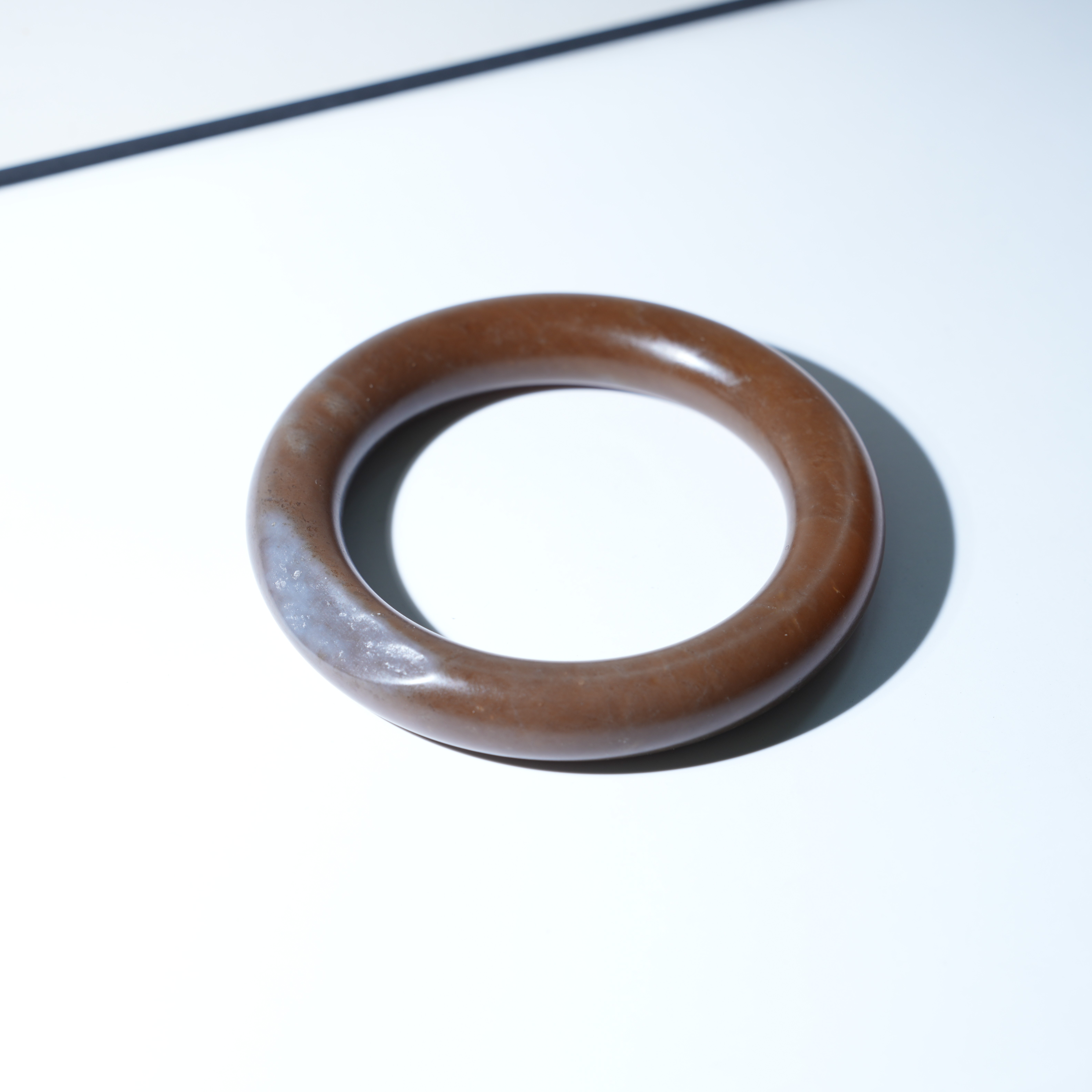 玉福堂 | 新疆且末红糖圆条玉镯56mm