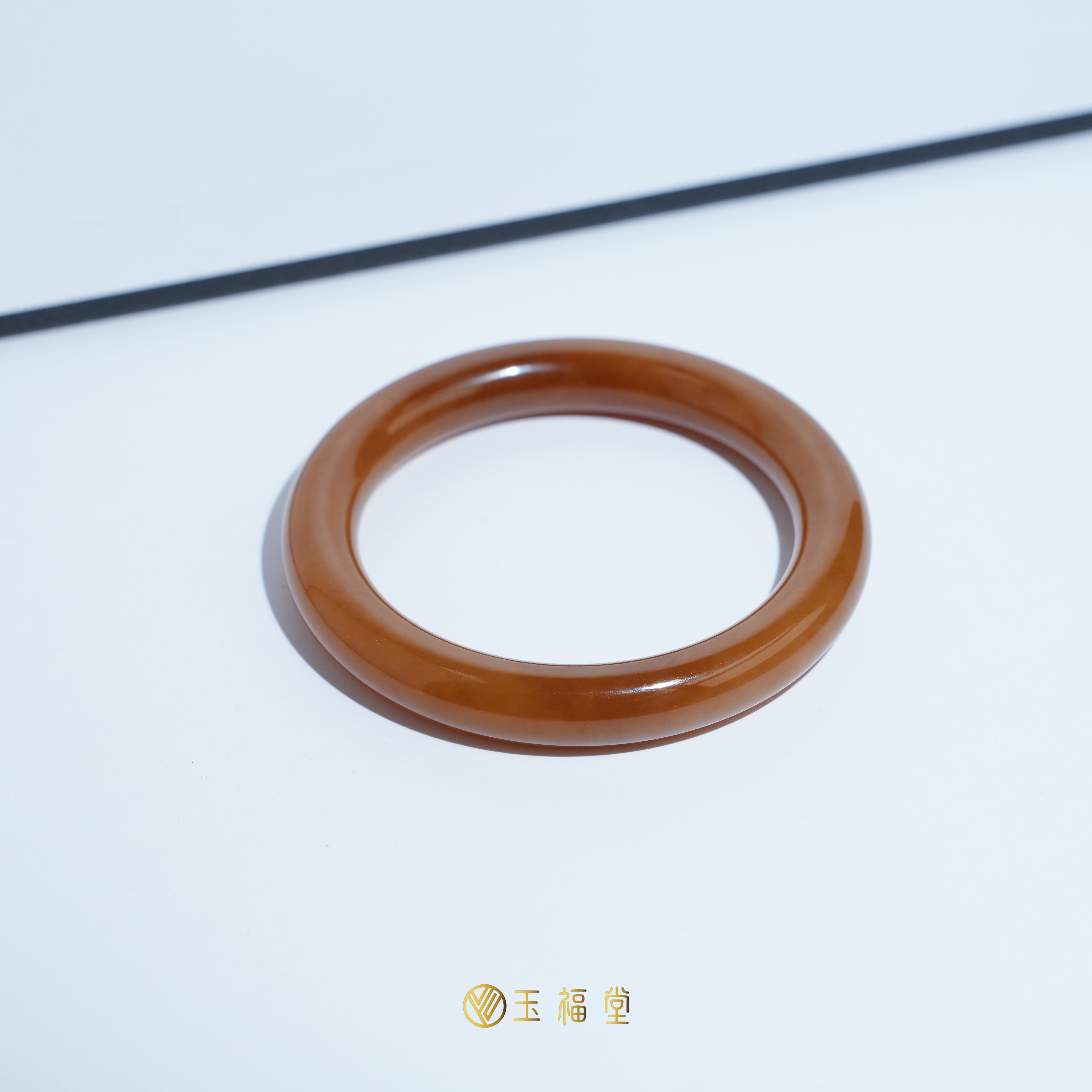 玉福堂 | 新疆和田玉且末糖玉手镯 | 红糖圆条镯子玉镯55-58mm