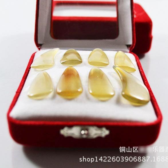 厂家销售牤牛角加厚凹槽古筝指甲 儿童成人古筝指甲八片盒装