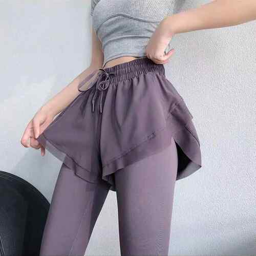 High waisted yoga pants for women, worn for running and