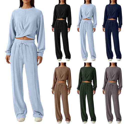 Women's long sleeved top with elastic waistband and wide