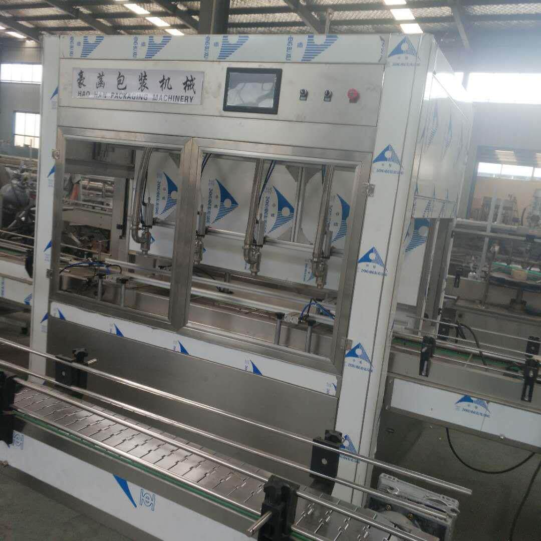 全自动称重式灌装机食用油灌装机18升润滑油机油拉线油灌装机