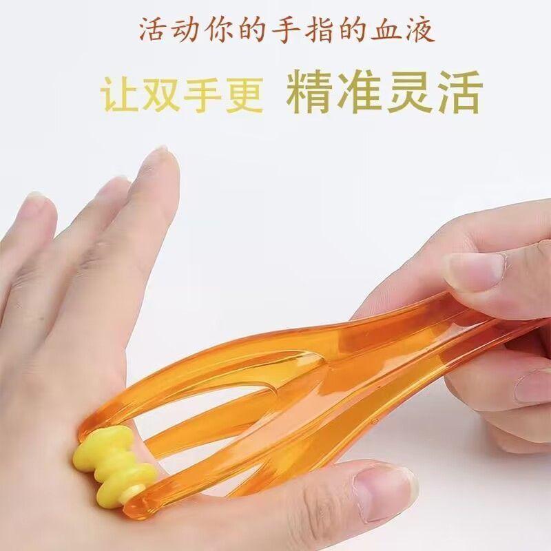 硅胶瘦手指按摩器关节变细长滚轮揉捏磁珠漫画多功能手部护理神器