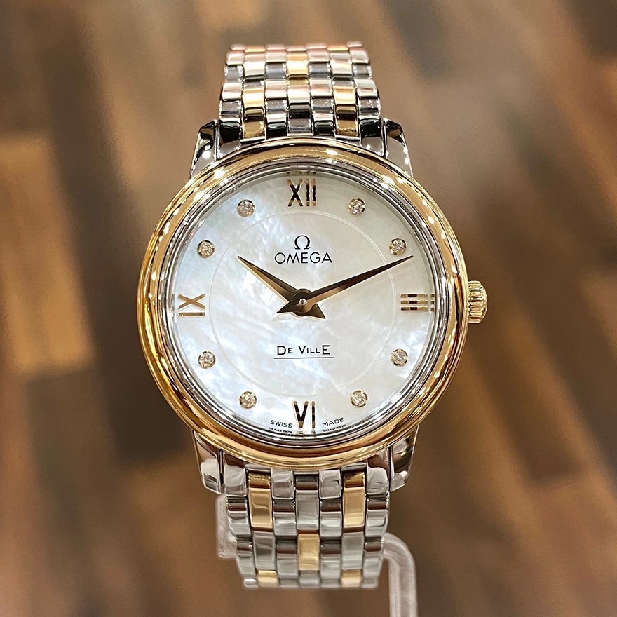 9.8新欧米茄碟飞27mm手表18K金精钢石英女表424.20.27.60.55.001