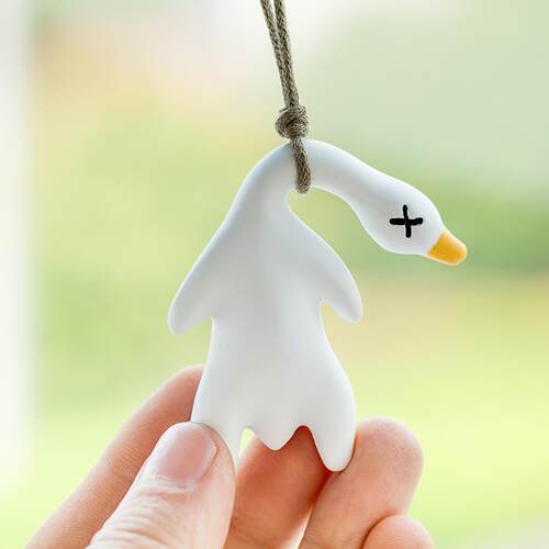 Color-changing roast duck pendant that changes color under U