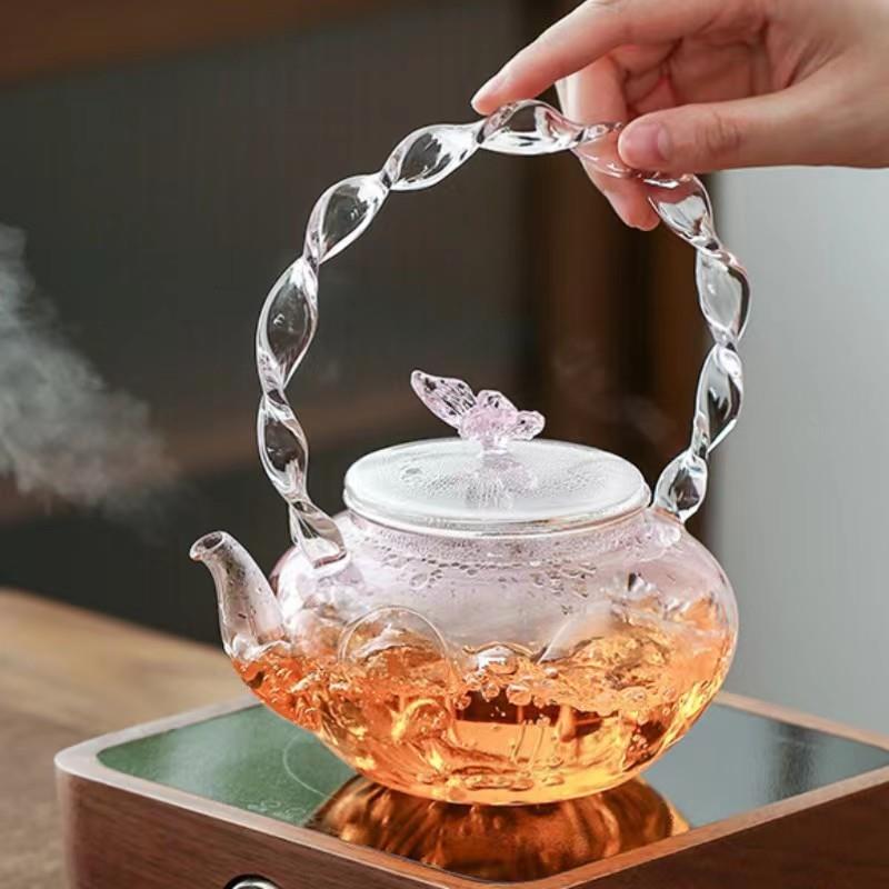 粉色高硼硅玻璃提梁茶壶 电陶炉加热煮茶壶 麻花把手泡茶壶蝴蝶壶
