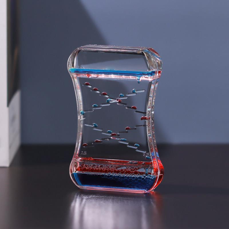 。滑梯礼物液体双色沙漏计时器水晶水滴流动双色油滴流沙摆件油漏