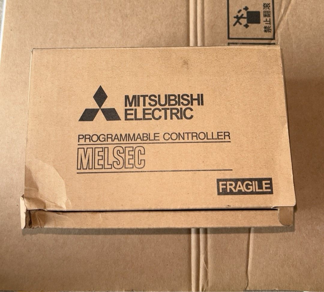 三菱PLC 厂里买回来的 当备件  仅装了程序 实图拍摄 带
