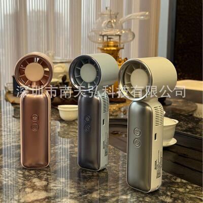 26新品手持握冰风扇F606半导体制冷超长续航挂脖充电风扇小型降温
