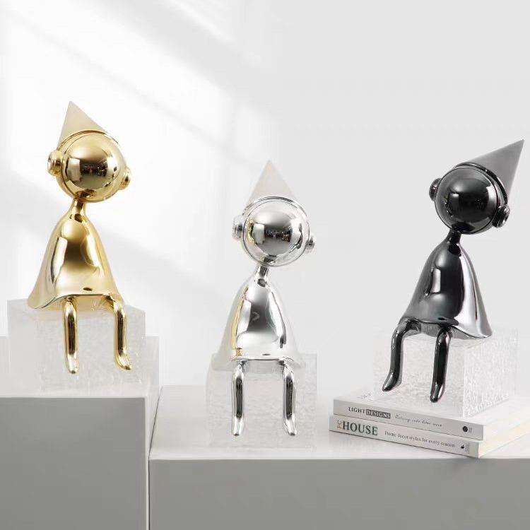 现代鸦简约摆卡通创意人物电镀姿乌人样板间坐客厅565房间装饰树