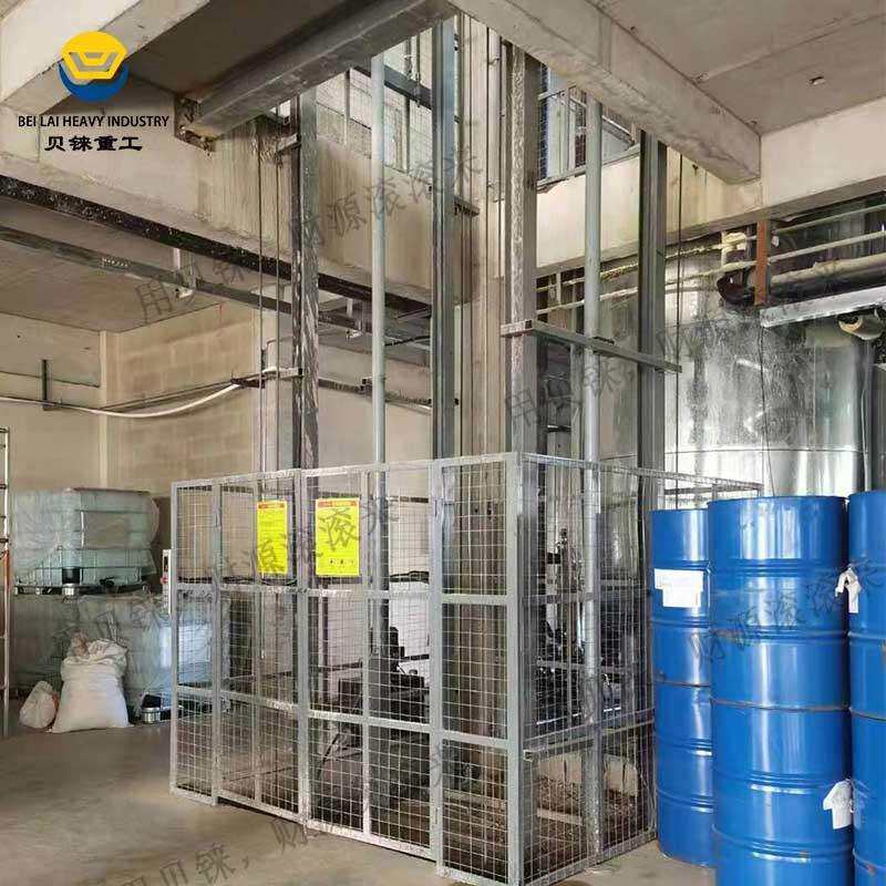 1吨化工厂升降梯液压升降平台仓库电动工业货梯导轨链条式升降机