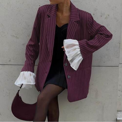 Striped suit jacket with feminine lace flared sleeves,