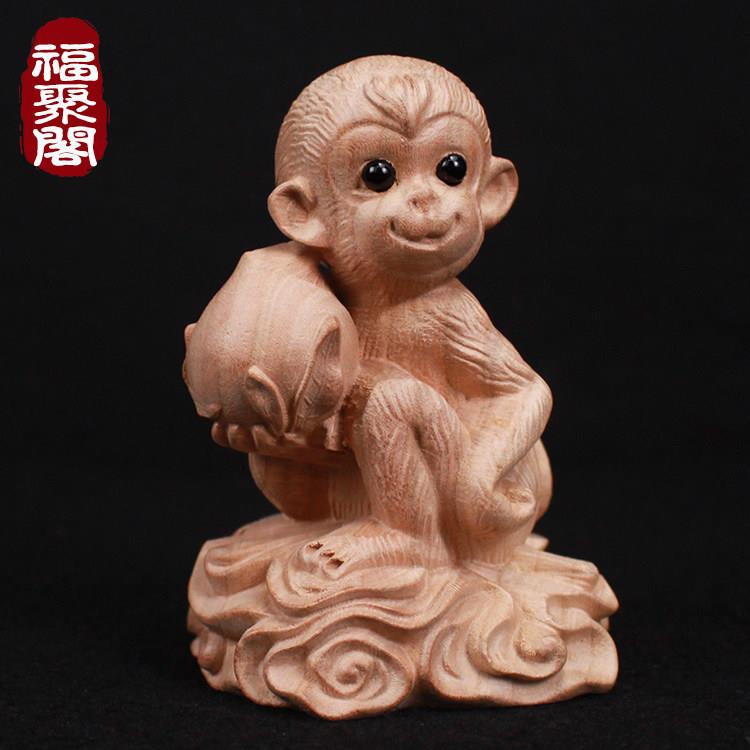 桃木猴摆件寿桃猴子木雕十二生肖实木办公室客厅吉祥物原木工艺品图片
