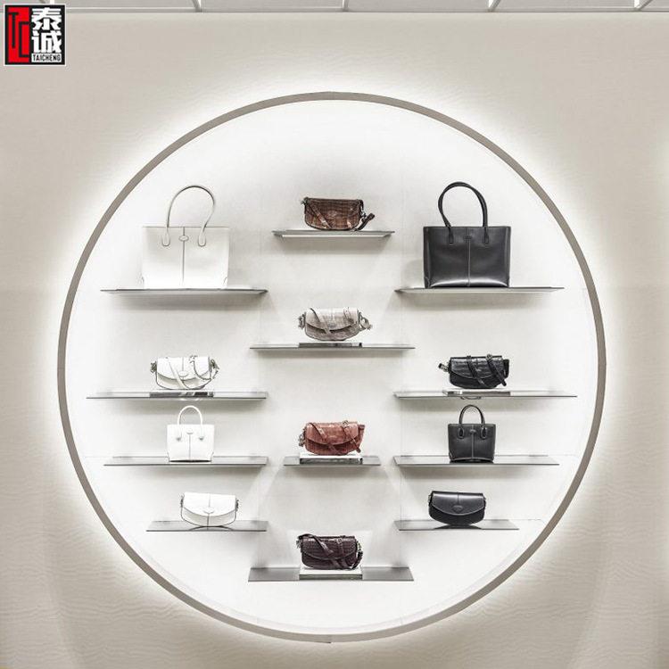 品牌包包展示架商用墙面皮具箱包陈列架不锈钢带灯奢侈品钱包展柜