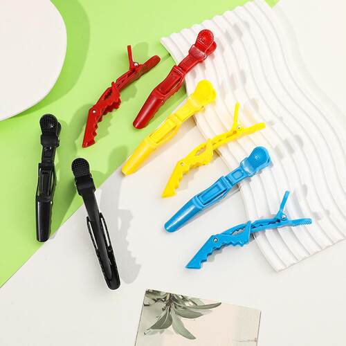 Duckbill clips, hairdressing clips, salon stylist positionin