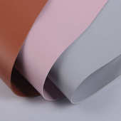 厂家直销PU羊纹双面革手感柔软Q弹桌垫革 家具革 耐磨包装