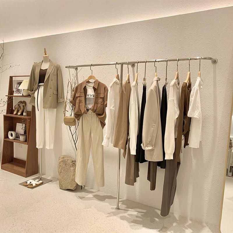 服装店上墙壁挂式展示架网红女装店挂衣架不锈钢侧挂挂衣杆可定制