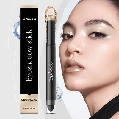 The zephoco champagne-colored eyeshadow stick has a light an