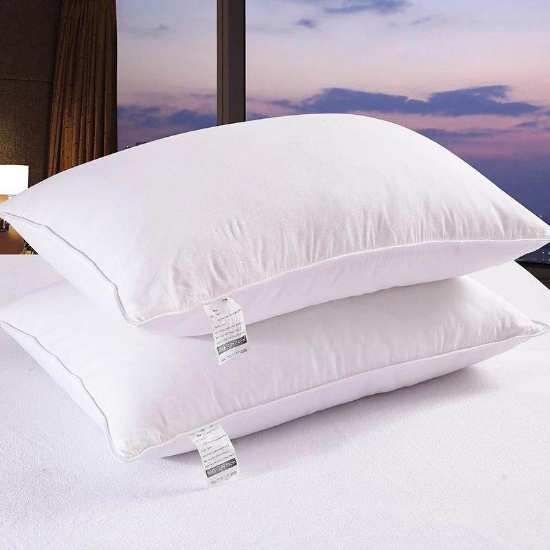 鹅绒枕芯填充90%白鹅绒80支纯棉防羽布料羽绒枕芯五星级酒店枕头