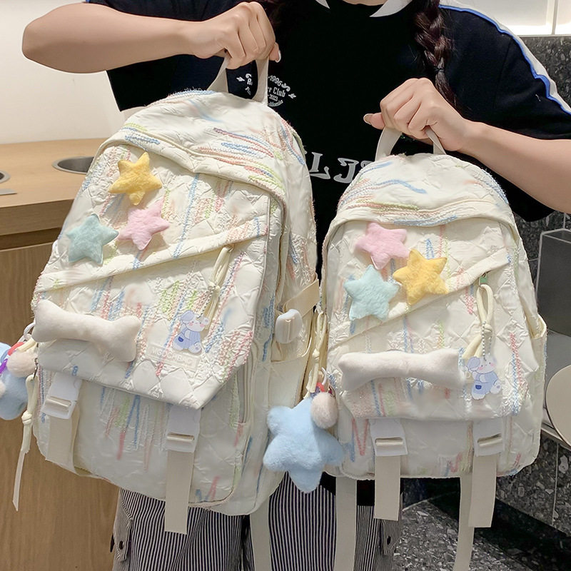 儿童书包女生小学生初中生条纹背包高中大学生2024新款时尚双肩包