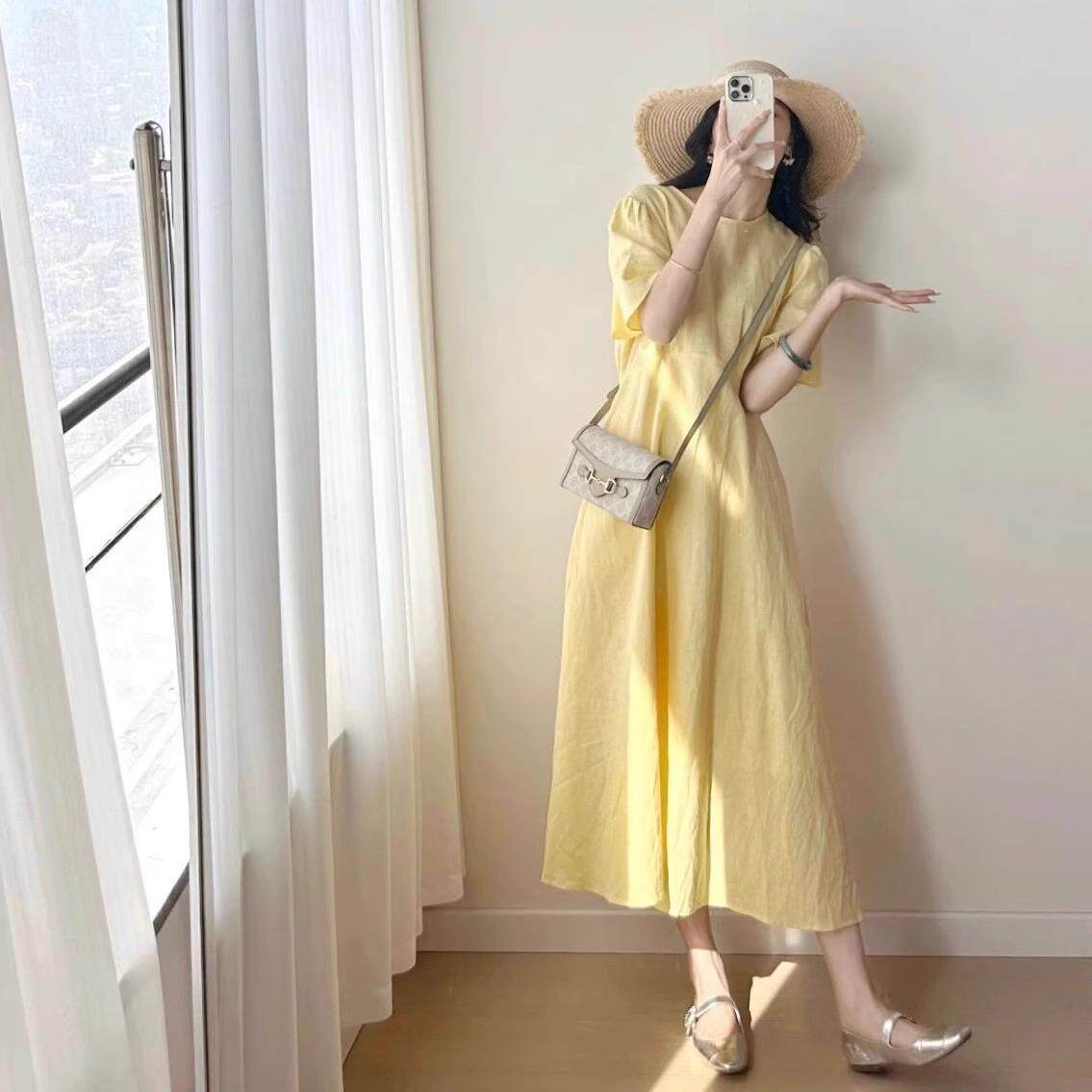 欧洲站夏季女装2026新款茶歇法式桔梗长裙遮肚子显瘦黄色洋装