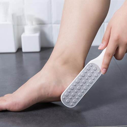 Foot care tool for removing dead skin, calluses, and hard sk