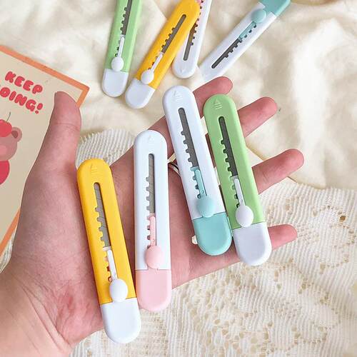 Candy-colored portable utility knife, perfect for unboxing,