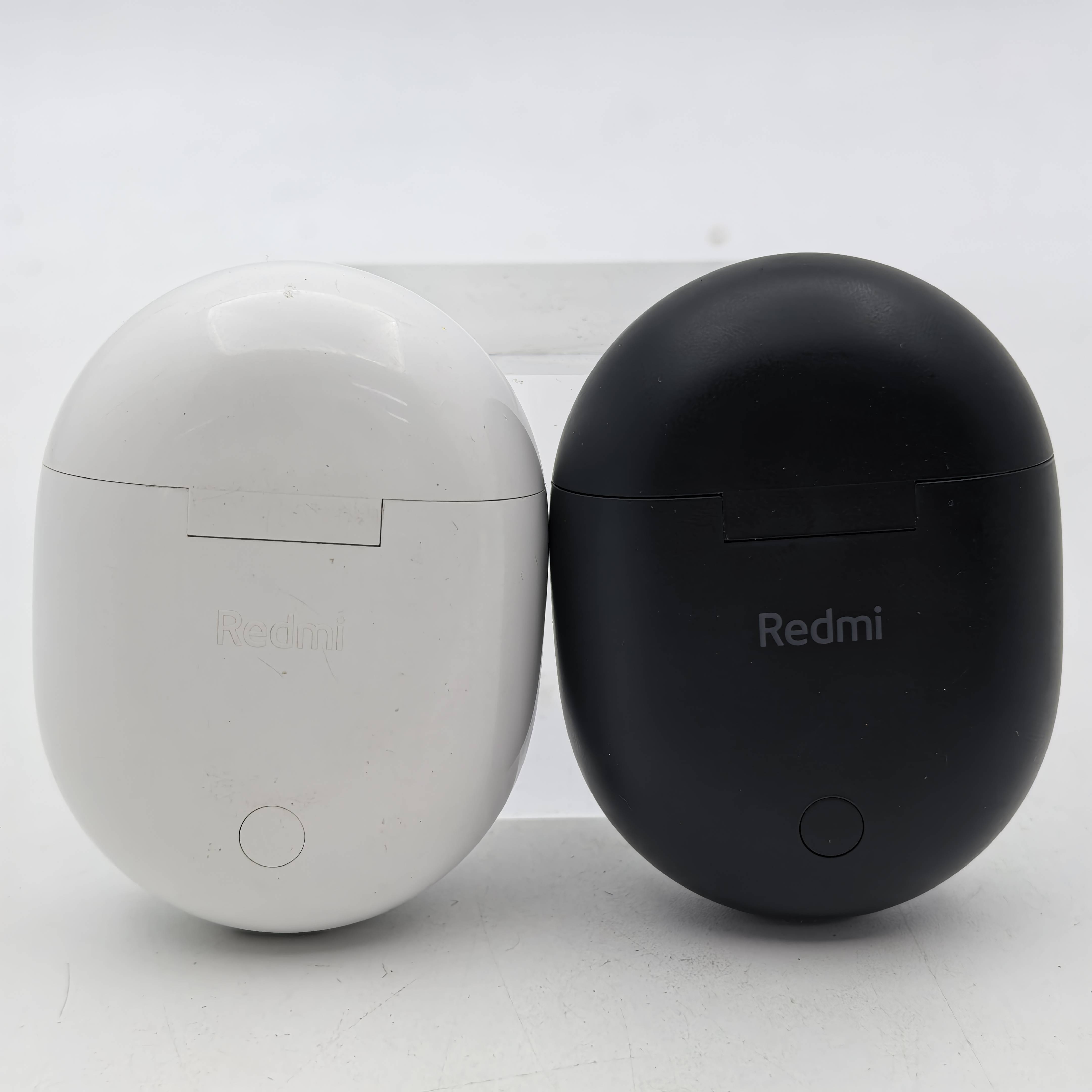 99 chiếc Redmi Redmi Budsmới 4% không có ngăn sạc tai nghe Bluetooth true wireless, tai trái và tai phải.