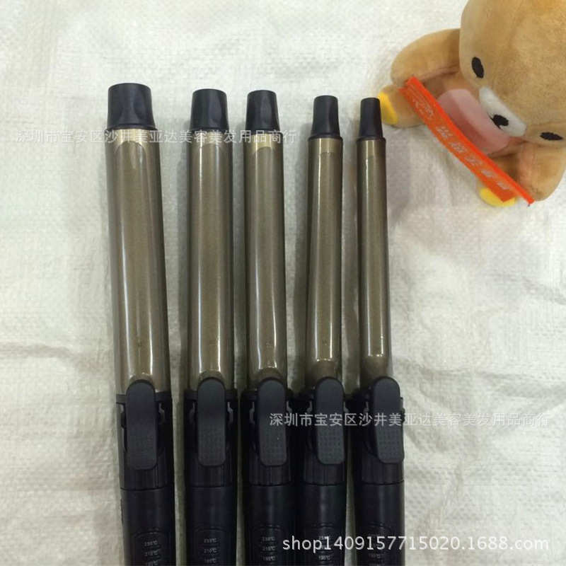 新款出口日韩卷发棒可转动单手操作影楼发廊化妆卷发器电卷棒