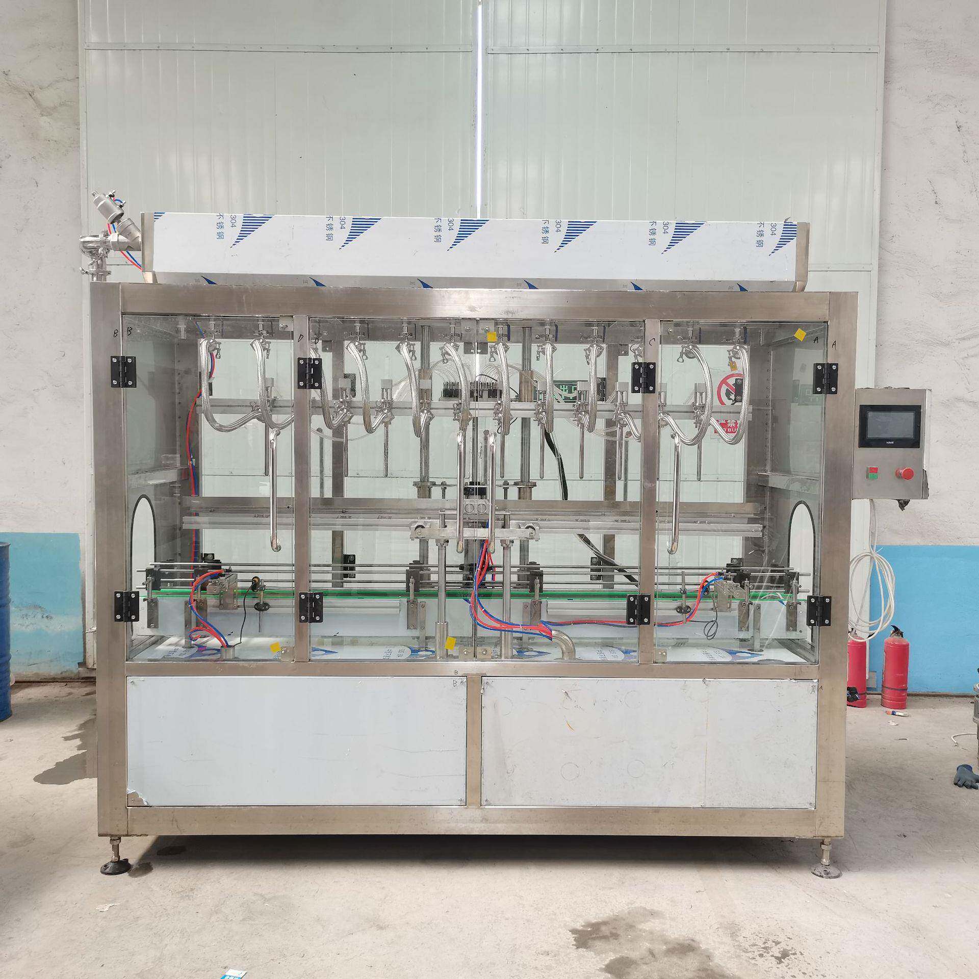 水性液体桶装白酒饮料酱油醋玻璃水防冻液车用尿素直线自流灌装机