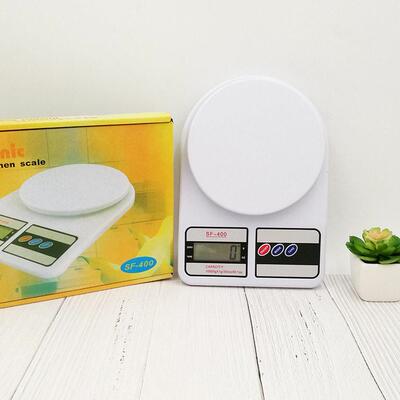 A compact digital kitchen scale for precise weighing, suitab