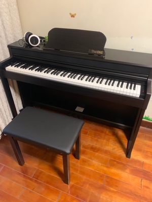 theone智能钢琴怎么样?一位专业人士用后一个月谈感受