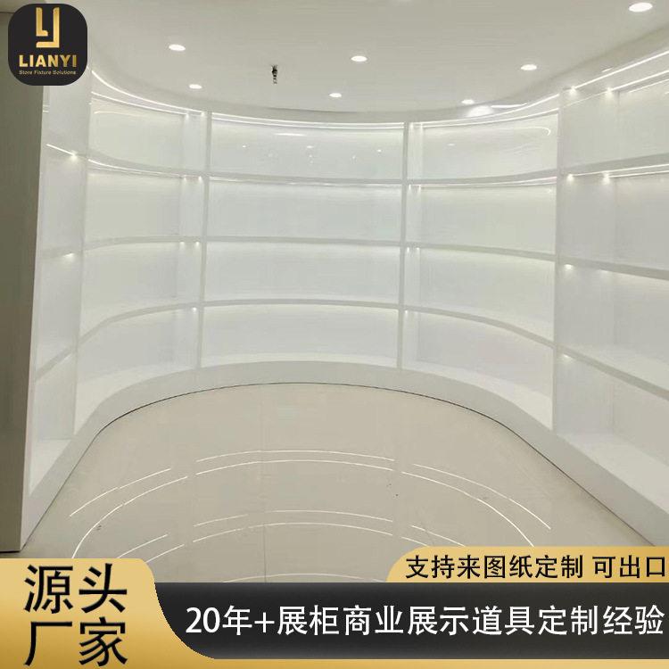 公司展厅展示柜产品带灯木质白色烤漆弧形展示柜包包产品陈列墙柜