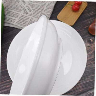 Plain white ceramic salad bowl deep soup plate chopped peppe