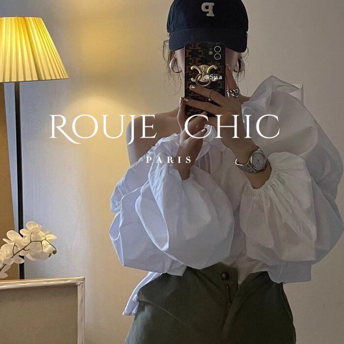 法国rouje chic2025早春季一字肩设计感白色斜肩衬衫女泡泡袖上衣
