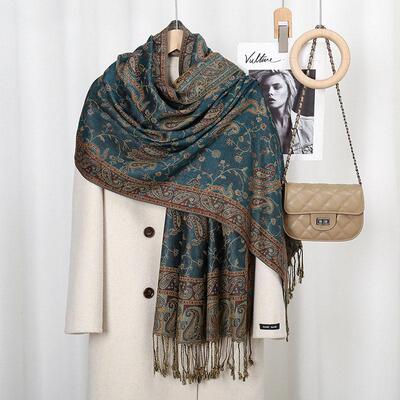 Women with long scarves printed with cashew nuts are vogue