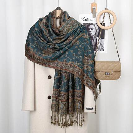Women with long scarves printed with cashew nuts are vogue