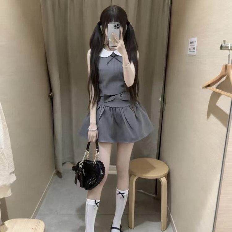 进钱钱口袋里【少女心事】蝴蝶结娃娃领无袖上衣+褶皱短裙套装女