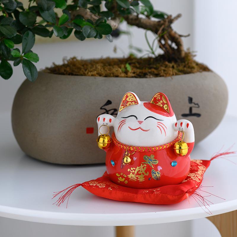 礼德化厂家铺直销陶瓷招财猫摆件店业品创开意存钱罐.
