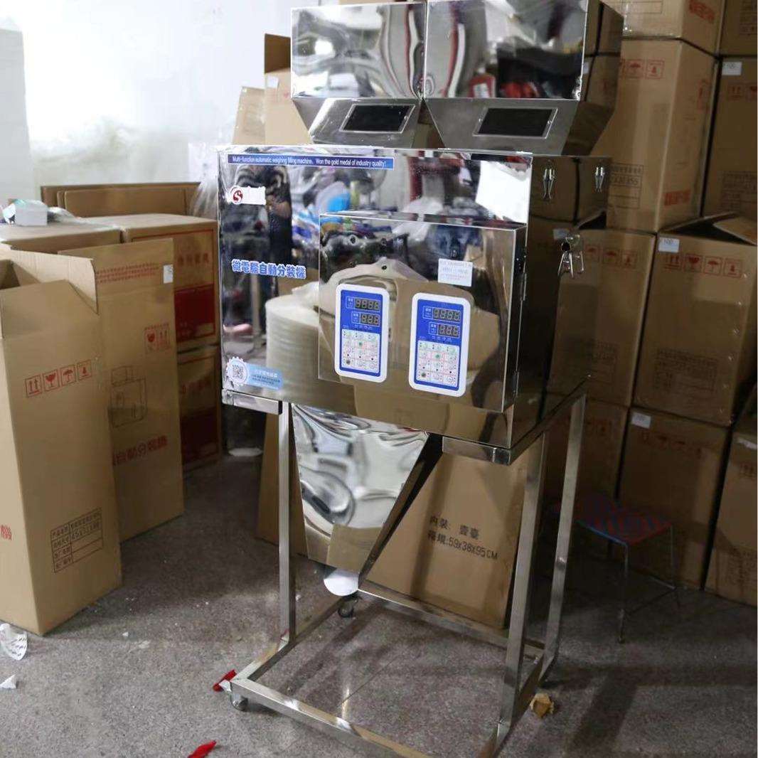 压缩毛巾智能分装机 振动盘螺旋下料分装称重机器