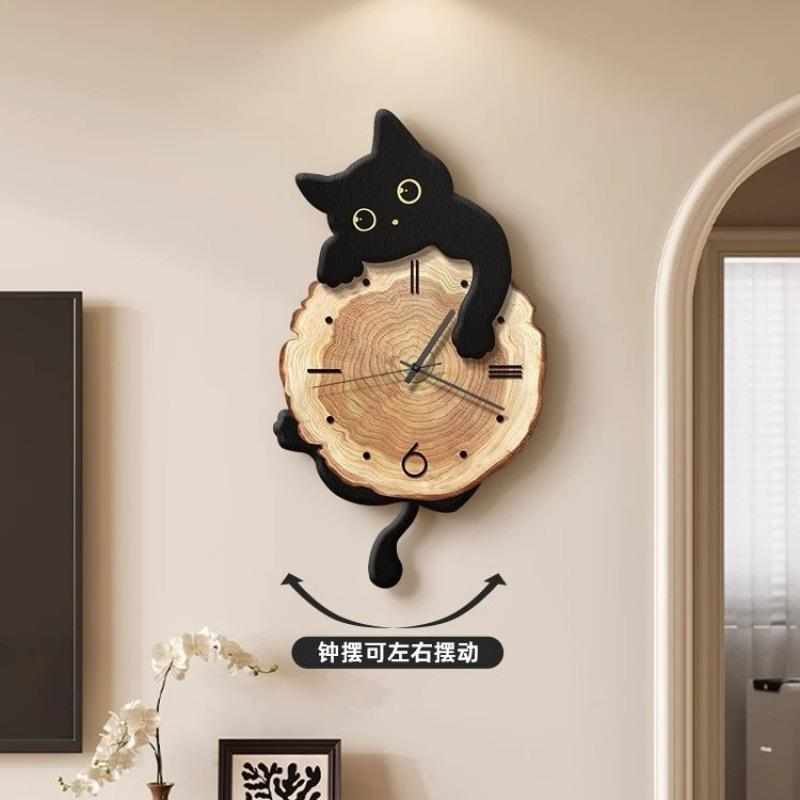 现代简约猫咪钟表挂钟客厅2025  新款创意时钟挂墙高级感艺术挂表
