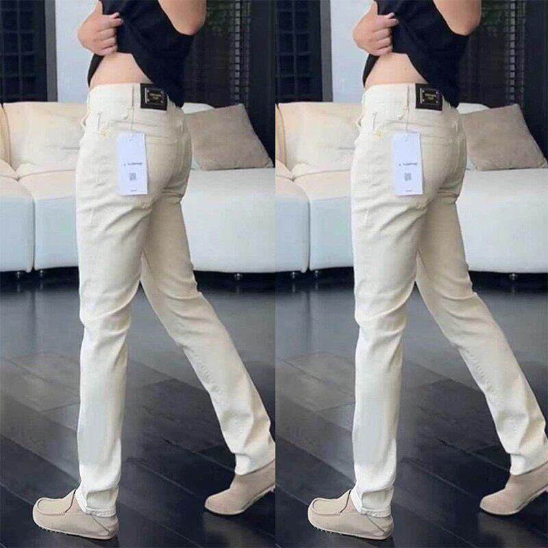 欧洲站修身小脚牛仔裤男秋冬新款百搭弹力休闲长裤米白色潮流裤子