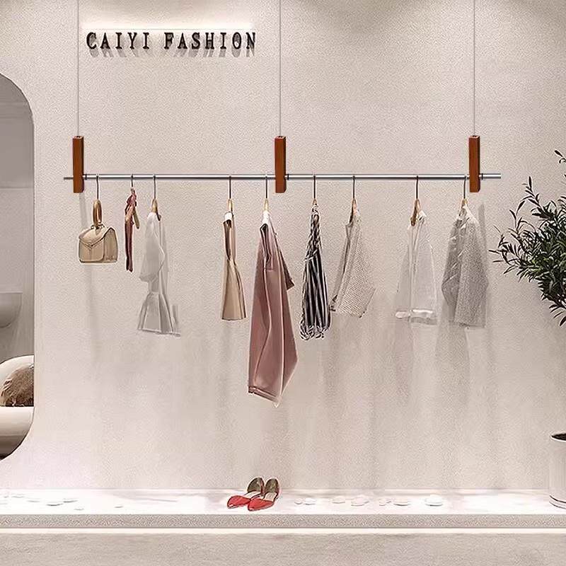 不锈钢挂衣架悬挂架木纹色实体店装修婚纱服装店展示架买 手店吊