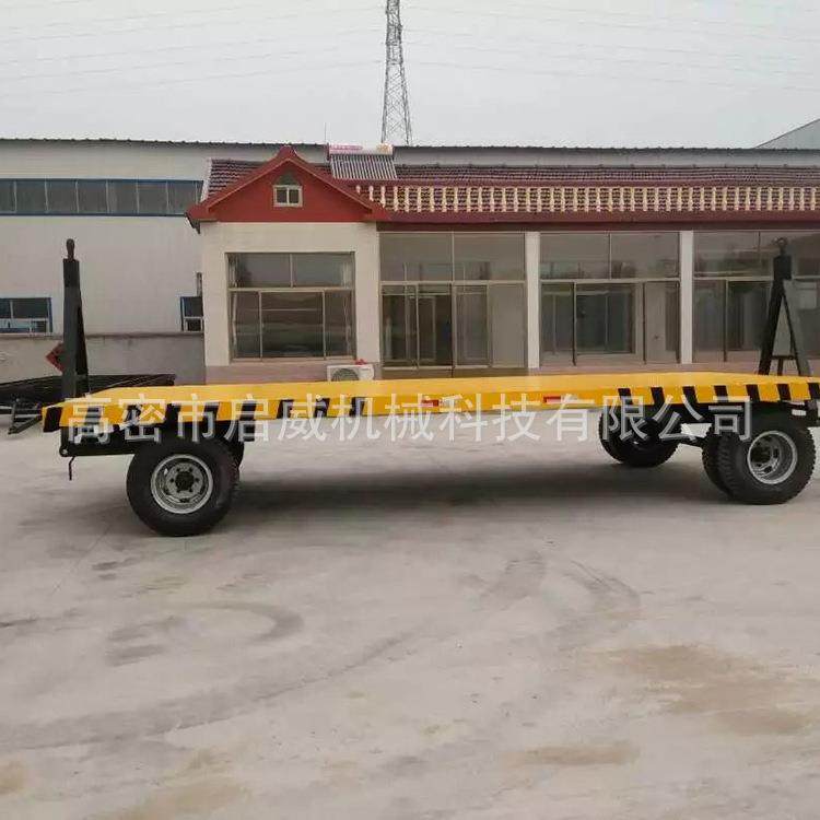 双向牵引充气胎平板拖车可移动运输工具车20吨全挂平板拖车