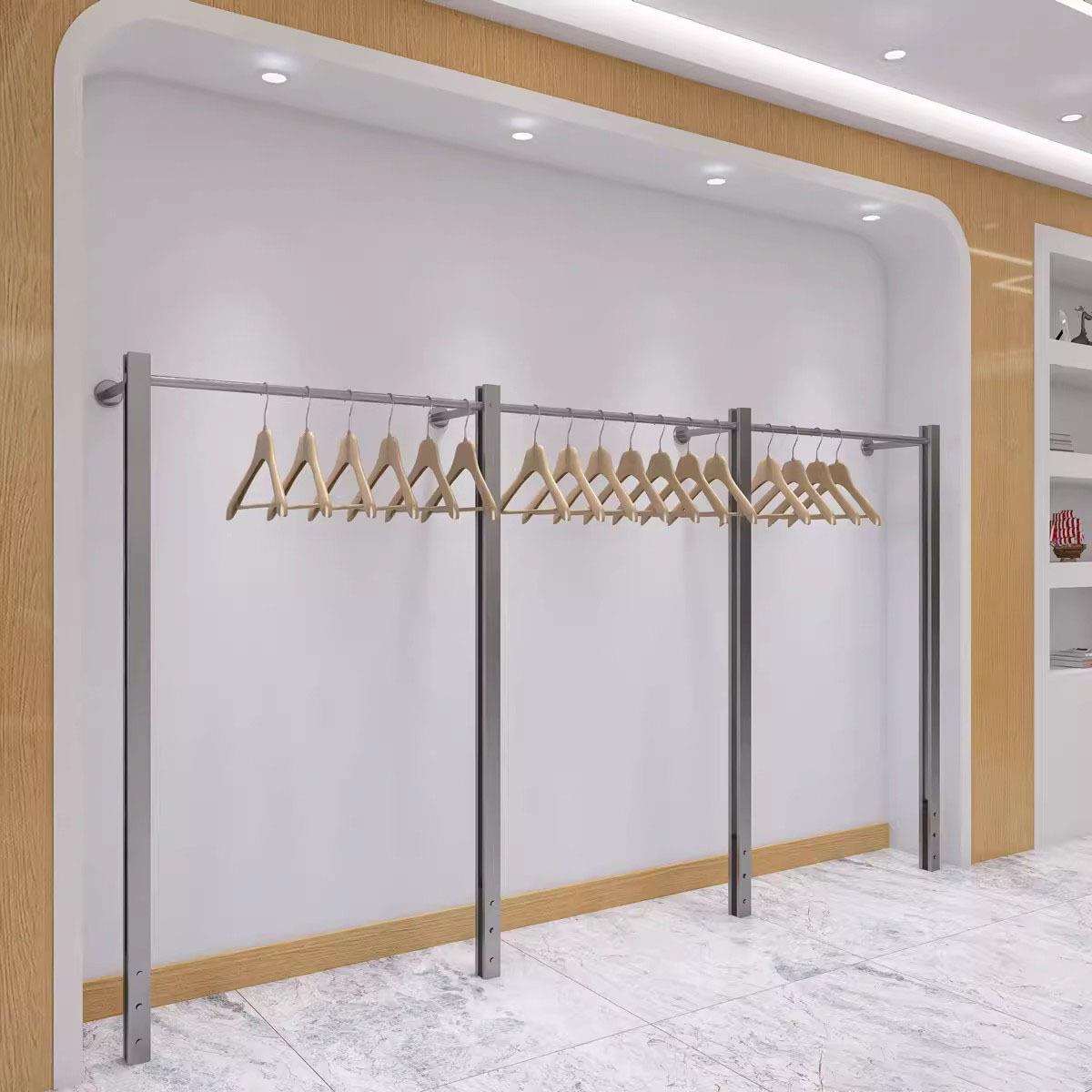 女装店上墙不锈钢货架服装店衣服展示架落地童装壁挂式陈列挂衣架