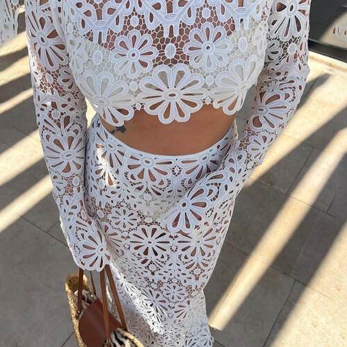 Hollow out long sleeved short top and skirt set