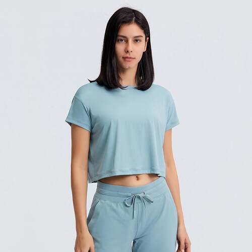 Yoga short sleeved half cut yoga suit for exercise and